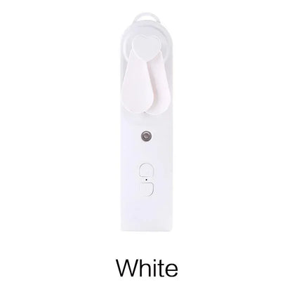 2-in-1 Handheld Fan & Face Mist Humidifier USB Rechargeable | Wahooly 2-in-1 Handheld Fan & Face Mist Humidifier — USB Rechargeable, Skin-Hydrating Portable Cooler