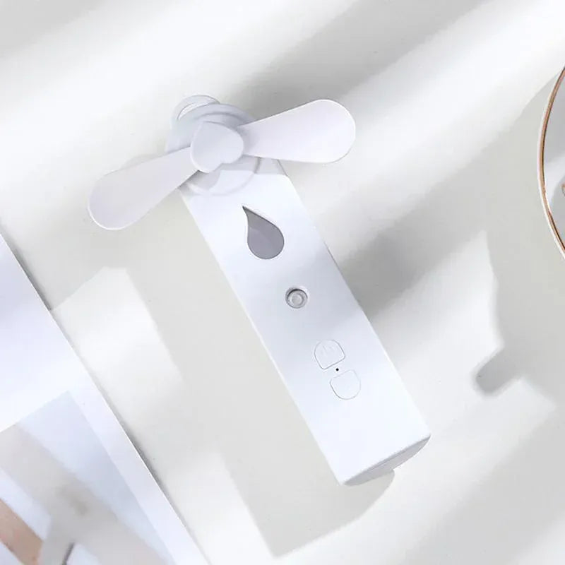 2-in-1 Handheld Fan & Face Mist Humidifier USB Rechargeable | Wahooly 2-in-1 Handheld Fan & Face Mist Humidifier — USB Rechargeable, Skin-Hydrating Portable Cooler