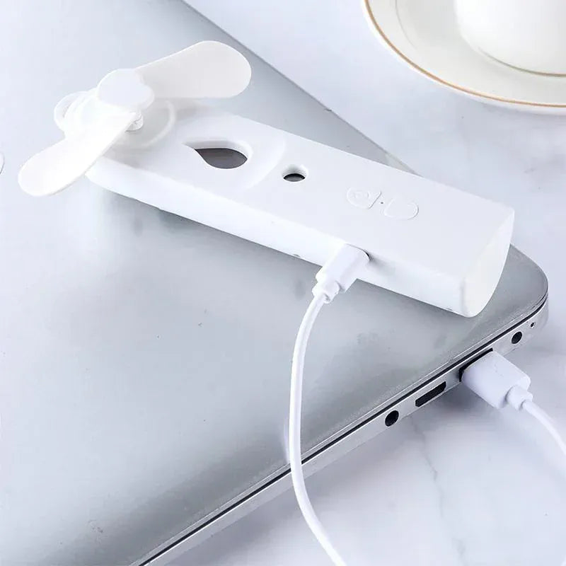 2-in-1 Handheld Fan & Face Mist Humidifier USB Rechargeable | Wahooly 2-in-1 Handheld Fan & Face Mist Humidifier — USB Rechargeable, Skin-Hydrating Portable Cooler