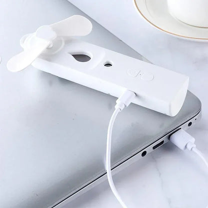 2-in-1 Handheld Fan & Face Mist Humidifier USB Rechargeable | Wahooly 2-in-1 Handheld Fan & Face Mist Humidifier — USB Rechargeable, Skin-Hydrating Portable Cooler