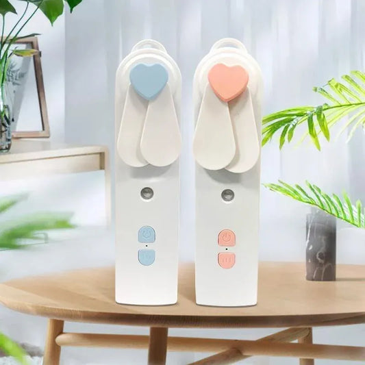 2-in-1 Handheld Fan & Face Mist Humidifier USB Rechargeable | Wahooly 2-in-1 Handheld Fan & Face Mist Humidifier — USB Rechargeable, Skin-Hydrating Portable Cooler