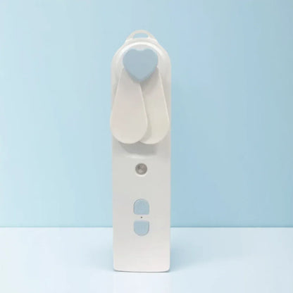 2-in-1 Handheld Fan & Face Mist Humidifier USB Rechargeable | Wahooly 2-in-1 Handheld Fan & Face Mist Humidifier — USB Rechargeable, Skin-Hydrating Portable Cooler