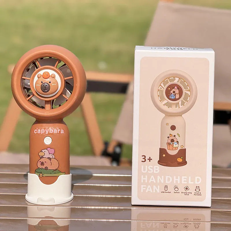 Capybara Mini Handheld Fan USB Rechargeable 3-Speed | Wahooly Capybara Mini Handheld Fan — USB Rechargeable, 3-Speed, Pocket-Sized Portable Cooler