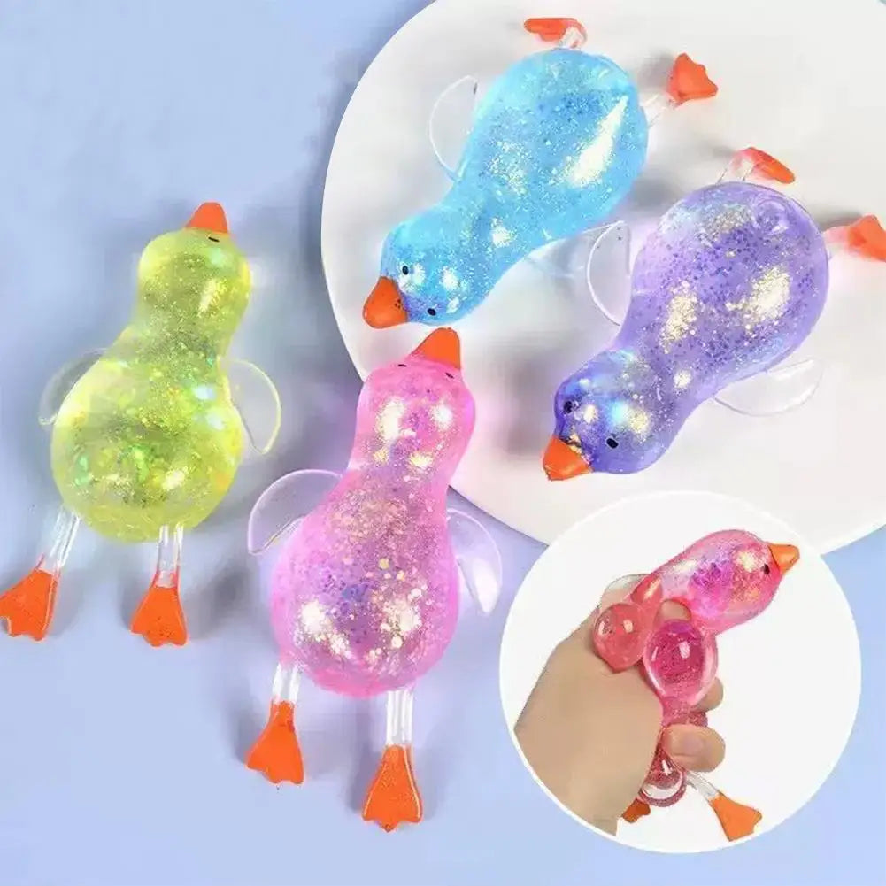 Glitter Duck Squishy Stress Relief Toy | TPR Material | Random Color | Soft Squeeze Fidget Toy for Anxiety Relief | Portable Glitter Duck Squishy Stress Relief Toy | TPR Material | Random Color | Soft Squeeze Fidget Toy for Anxiety Relief | Portable