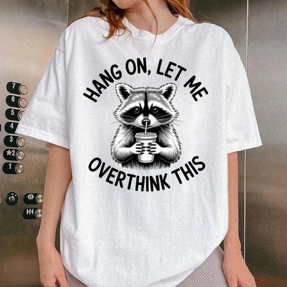 Raccoon Overthinking Humor Graphic T-Shirt 100% Cotton Unisex Summer Tee | Wahooly Raccoon Overthinking Humor T-Shirt – "Hang On Let Me Overthink This" 100% Cotton Unisex Graphic Tee