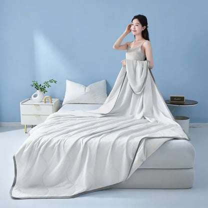 Silky Cooling Summer Quilt Lightweight Comforter 10 Colors | Wahooly Silky Cooling Summer Quilt – Lightweight Air Conditioner Comforter for Hot Sleepers